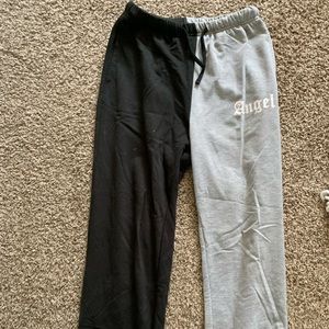 These pants are gray and black and say angel on the side.